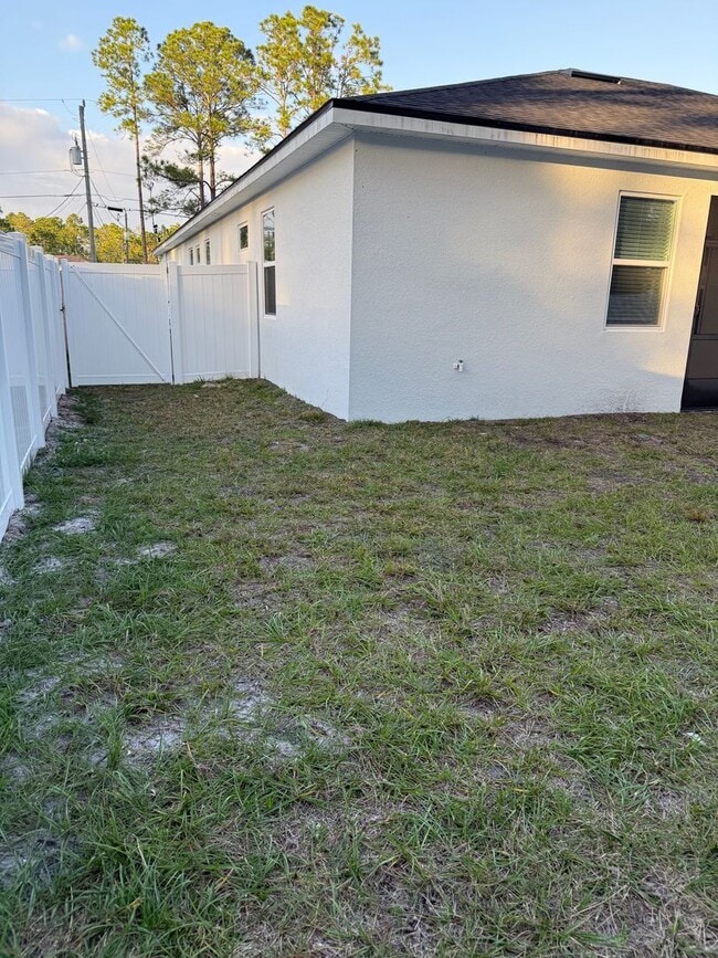 Building Photo - Brand new 3/2/2 with fenced in yard and a screened in porch! 50% off first month rent!