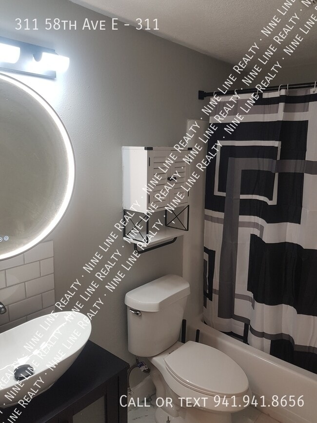 Building Photo - 311 58th Ave E