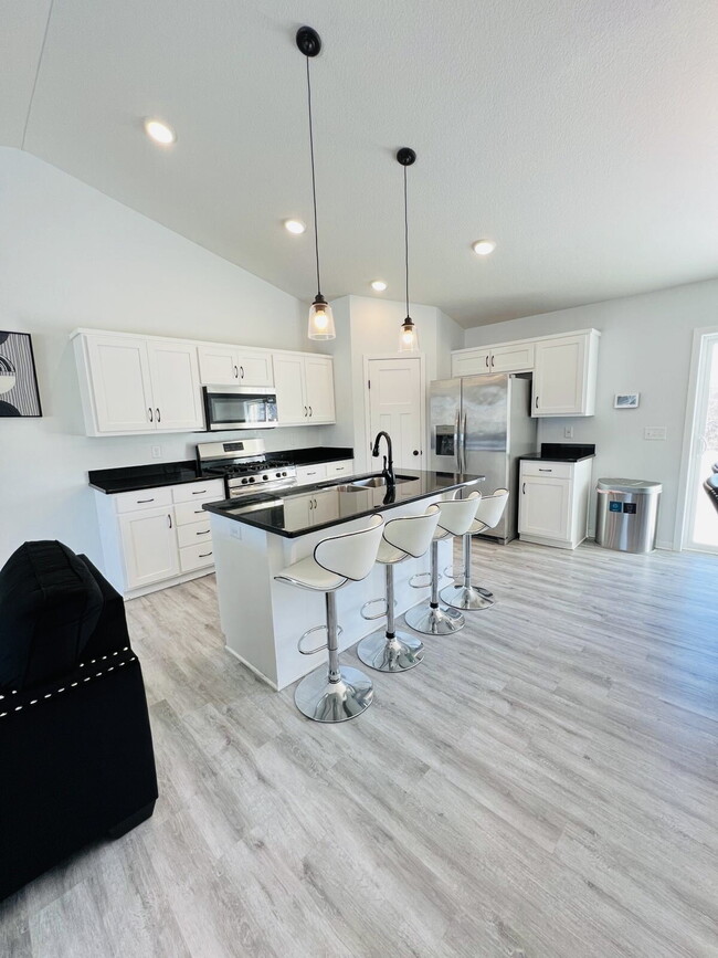 Building Photo - Newer Development Home Spacious 4-Bedroom 3 Bathroom Single Family Home with Finished Basement in...