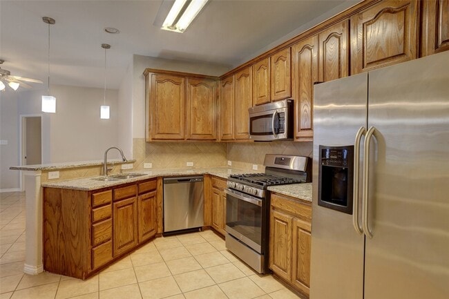 Building Photo - 5916 Round Up Ln