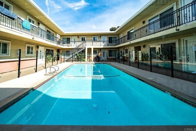 Building Photo - Prime Location! Pet-Friendly 1-Bedroom Condo Near Beach & Naval Bases