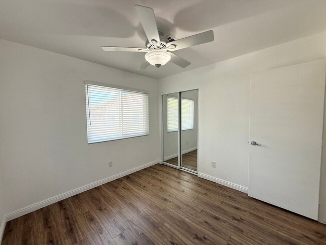 Building Photo - Corner Lot Beauty with Open Living, Guest Suite Down & Expansive Backyard