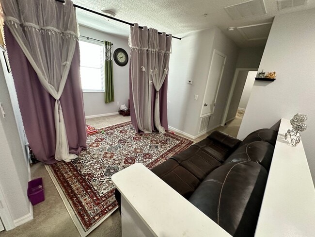 Building Photo - Lease this 3BR End-Unit Townhome in Gated Community with Water View!