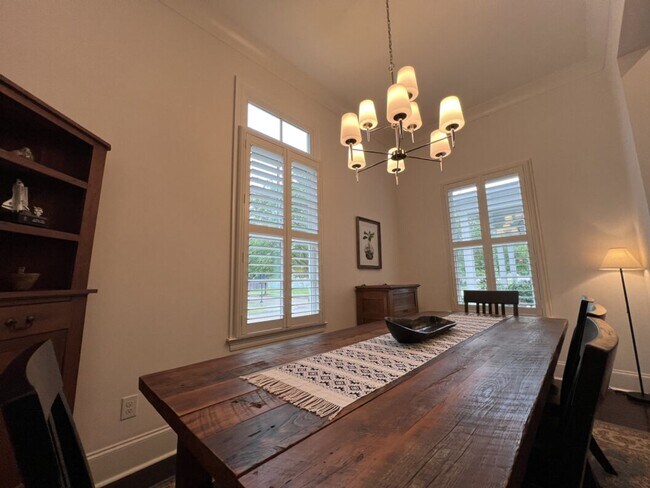 Building Photo - Luxury 4BR Home in Americana | 11 Ft Ceilings, Courtyard Living & Furnished Option