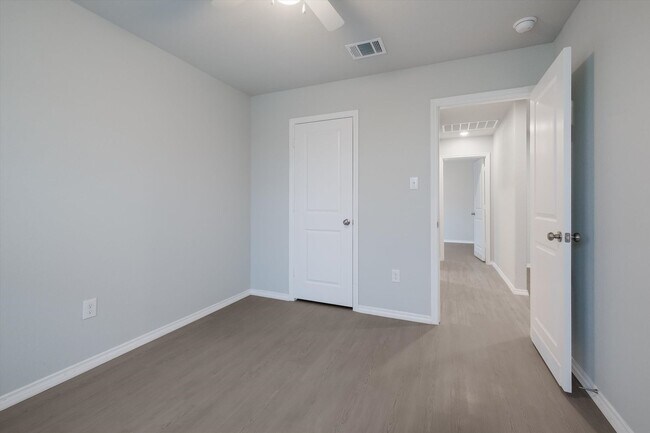 Building Photo - Open-Concept Living with New Flooring