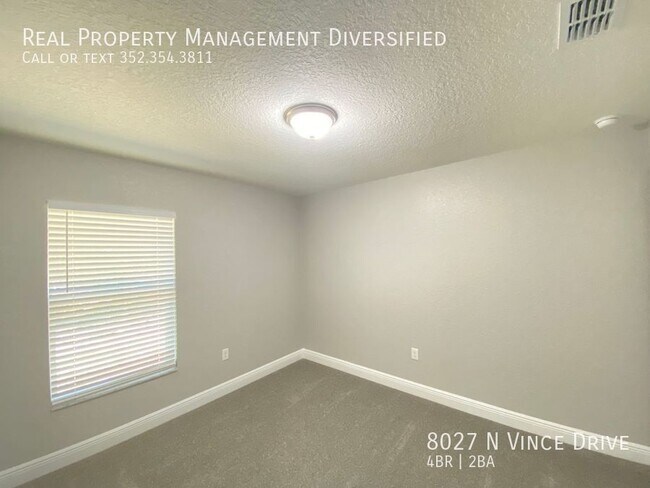 Building Photo - 8027 N Vince Dr