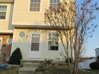Building Photo - Coming Soon – Spacious End-Unit Townhome w...