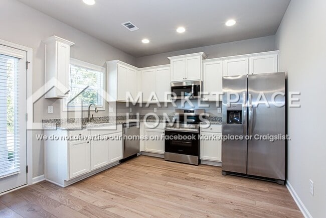 Building Photo - 214 W L Miller Dr