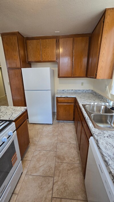 Kitchen - Freshly Painted Cabinets - 12821 Caswell Ave