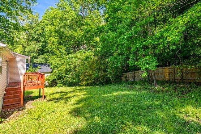 Building Photo - NW Home - Updated Kitchen and Bathrooms, Wood Laminate Flooring, Deck, Must See!