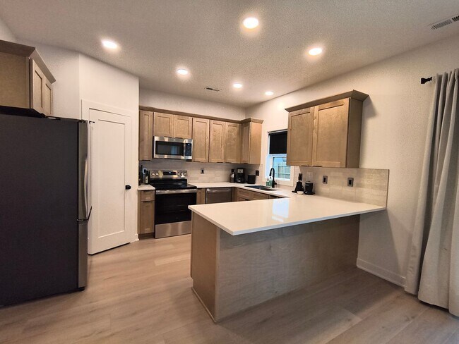 Building Photo - Modern 3-Bedroom Home Near Lake Manawa – Lake Views & Smart Home Features!