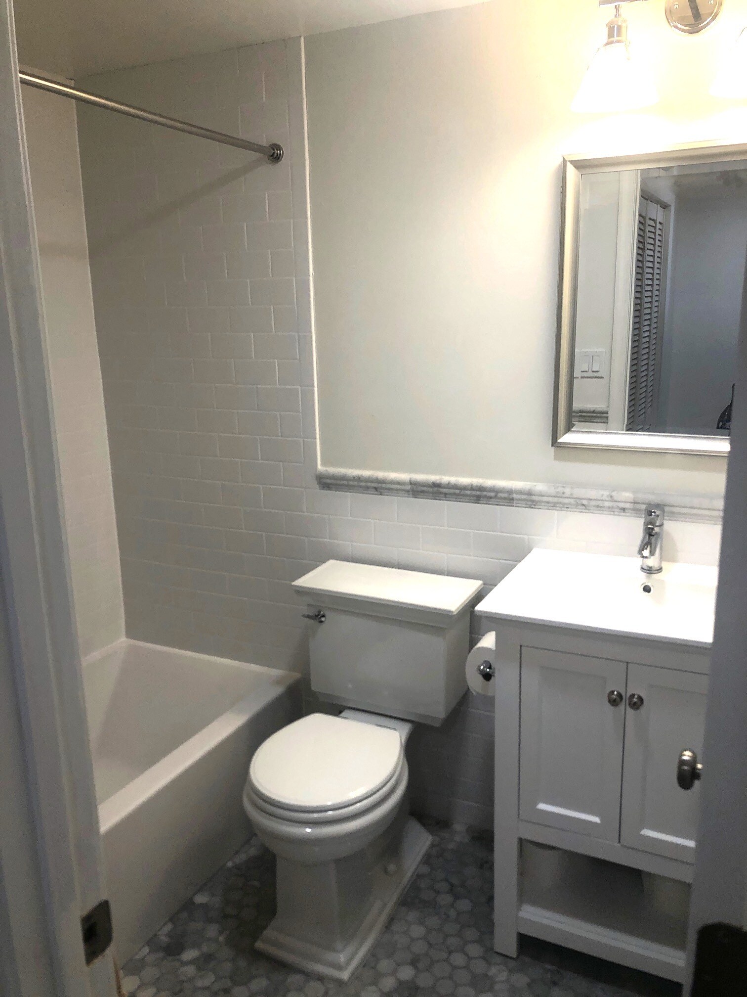 Renovated bathroom with carrera marble - 623 S Carolina Ave SE