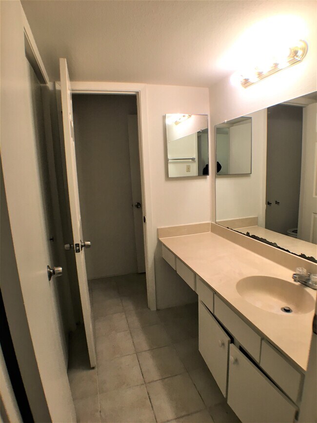 Vanity at hallway - 8201 Richmond Ave