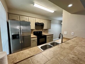 Building Photo - 5981 Arapaho Rd