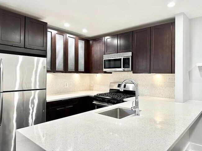 Building Photo - Sleek One-Bedroom in Eastern Market - Parking Spot Included!