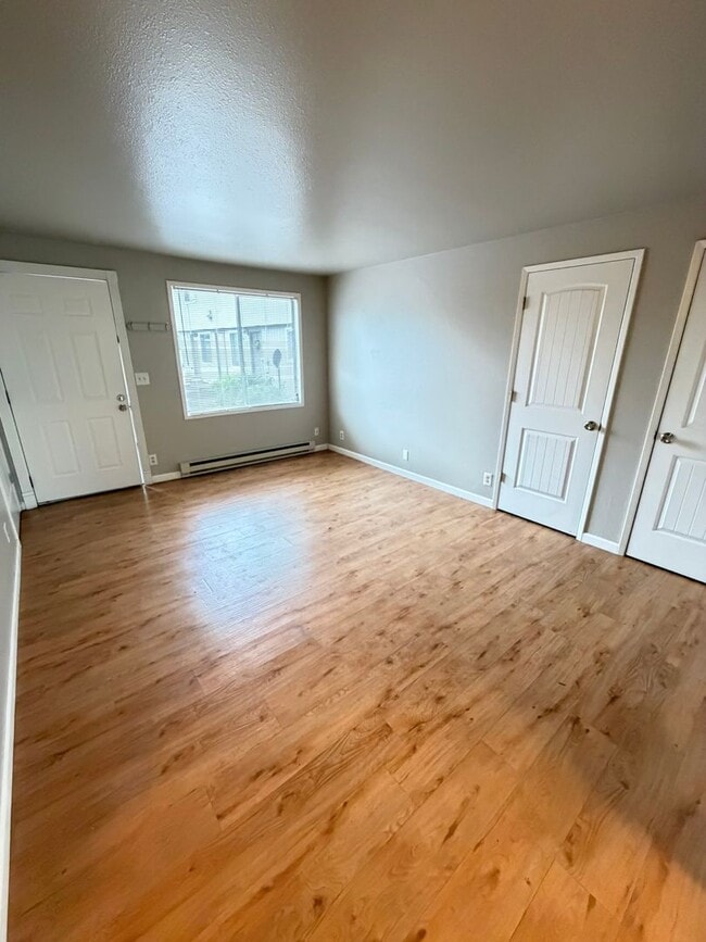 Building Photo - Update Two Bedroom on the First Floor with Covered back patio!