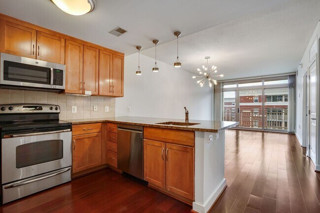 Building Photo - Sun-Drenched 1BR Condo with Rooftop Pool & Parking in Heart of Ballston