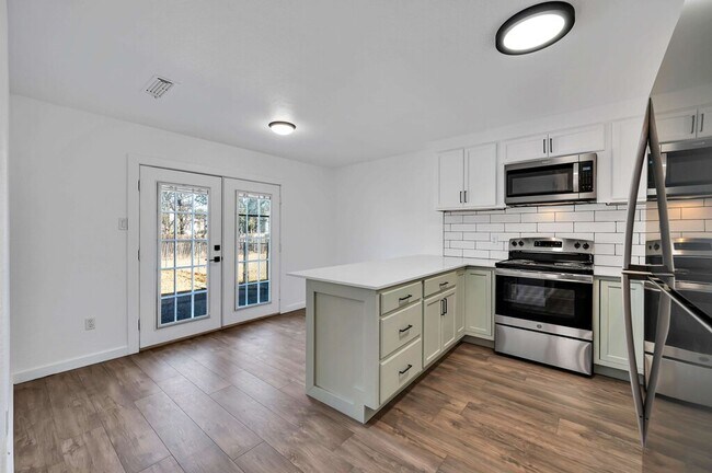 Building Photo - 5311 Tennyson Dr