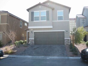 Building Photo - Beautiful 3 Bd, 2.5 bt Two Story home in a gated community with 2 car garage.