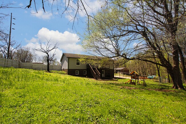 Building Photo - Pet Friendly Three Bedroom with Basement!