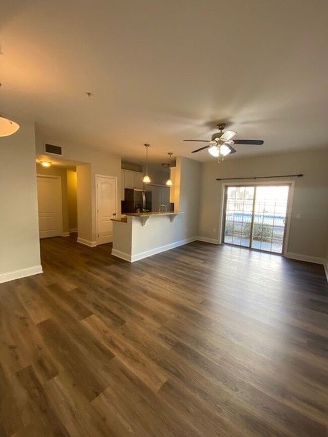 Building Photo - Welcome to this stunning 1st floor condo l...