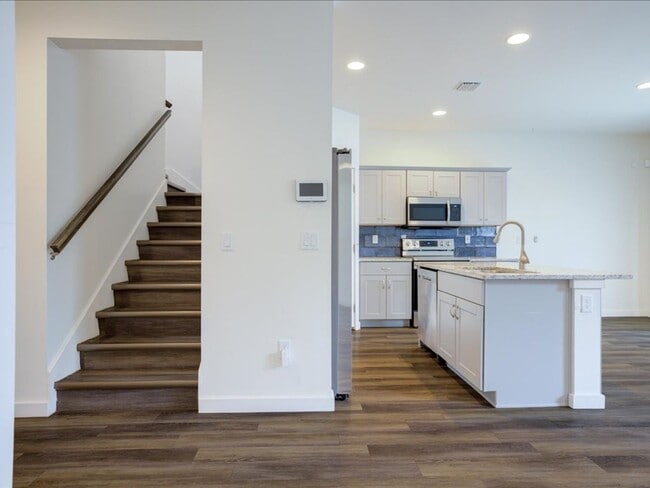 Building Photo - Stylish Two-Story Living with Modern Comforts!