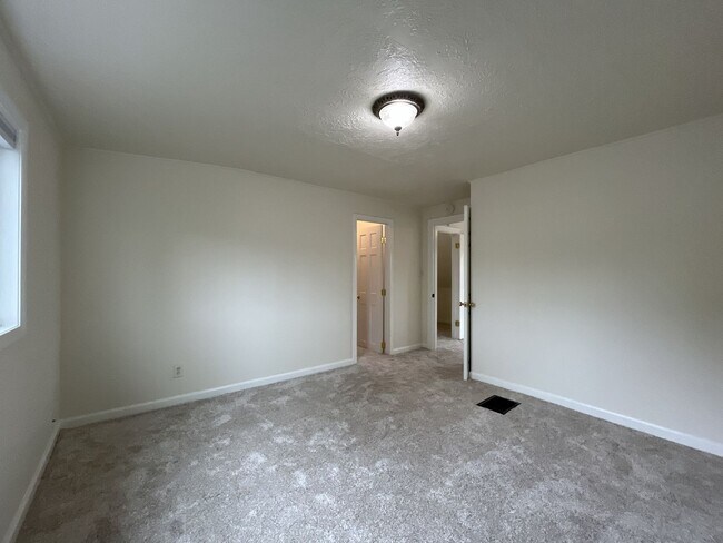 Building Photo - Character-Filled Concordia Home with Flexible Living Spaces & Gas Fireplace