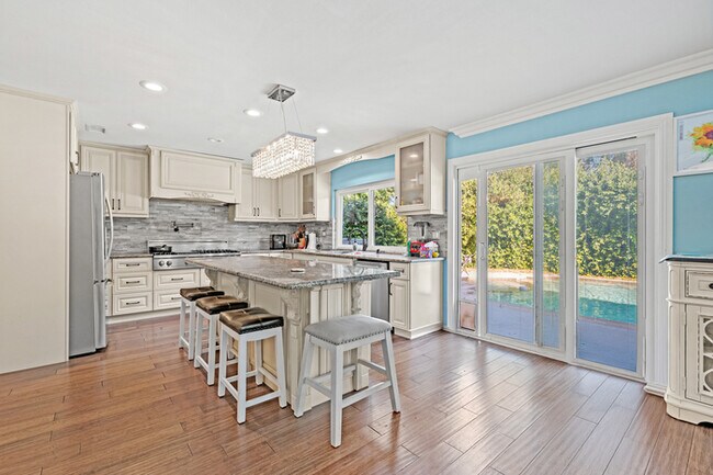 Building Photo - Spacious 4BR Family Retreat w Private Pool