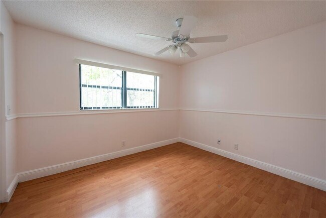 Building Photo - 10571 Royal Palm Blvd
