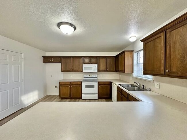 Building Photo - Newly Updated 3BR/2BA Corner Duplex in Lindale ISD! Fenced Yard & 1 Car Garage!