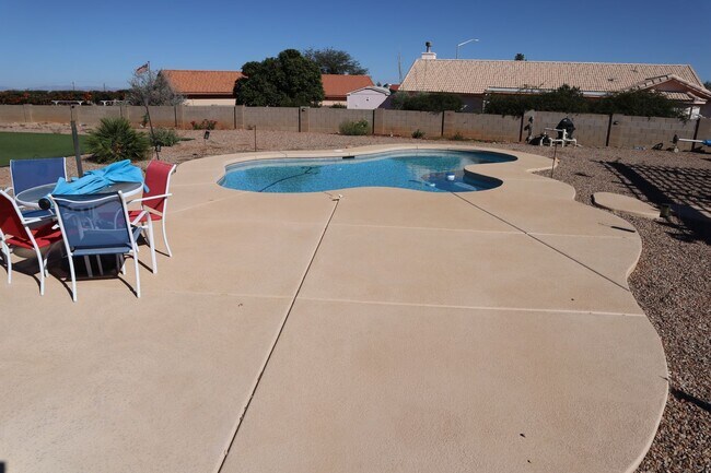 Building Photo - Home With A Pool and Much More!