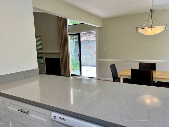 Building Photo - Great Natural light, Treetop Views with 2 Primary Suites plus OFFICE and a 2 car garage, It is li...