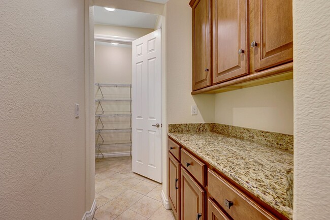 Building Photo - 5 Bedroom Corner Lot Home in Gated Community!