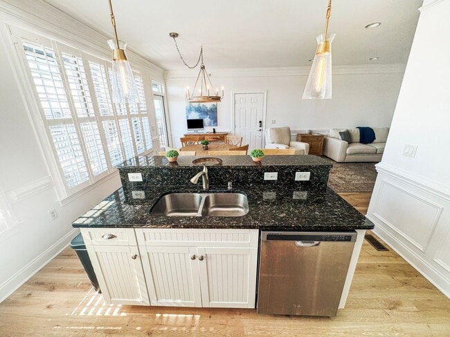 Building Photo - Fully Furnished Waterfront Elegance on Mai...