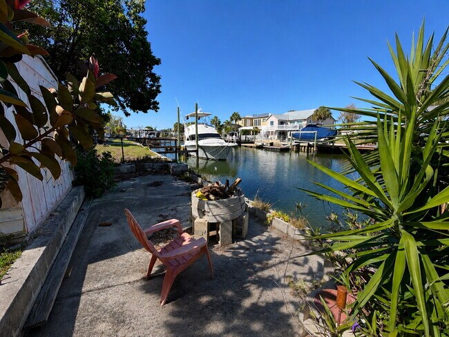 Building Photo - "Waterfront Home with Dock! 3-Bedroom Oasis with 2 Baths and 1,800 Sq Ft of Comfort in Hudson, FL!"