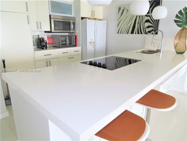 Building Photo - 5701 Collins Ave