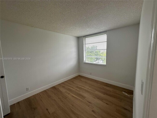 Building Photo - 8560 N Sherman Cir