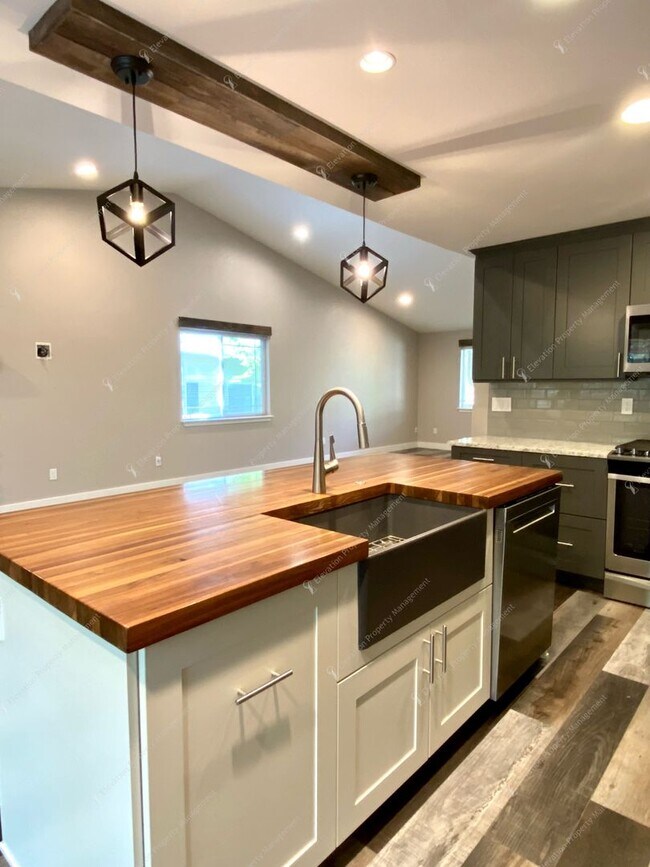 Building Photo - Updated Gem Near the River Trail – Minutes...