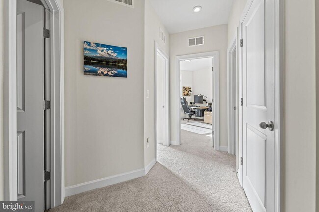 Building Photo - This beautiful 3 bed 2.5 bath 2-story condo provides a grand feeling with tall ceilings & over 16...