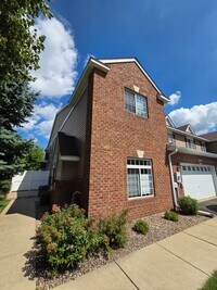 Building Photo - Stylish and Inviting; The Townhouse of Your Dreams!
