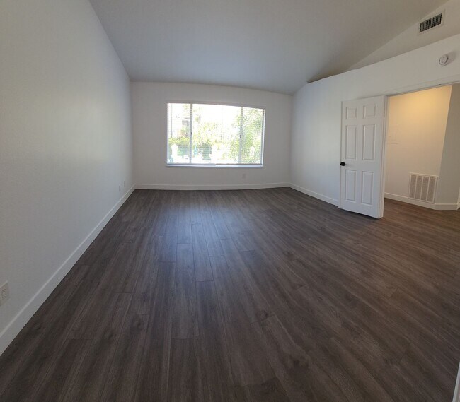 Building Photo - Gorgeous 2 bedroom newly renovated upstairs corner condo in gated community with pool & hill side...
