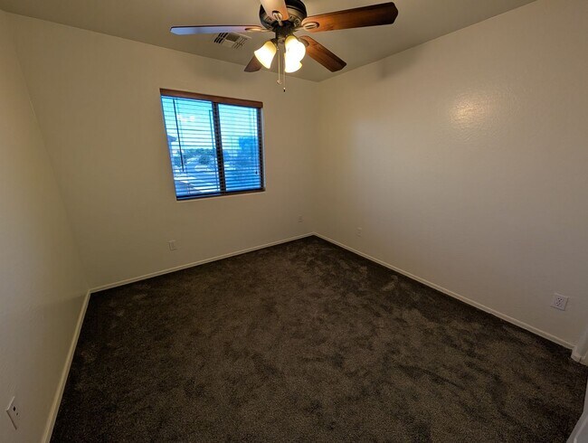 Building Photo - Community pool *Covered back patio with ex...