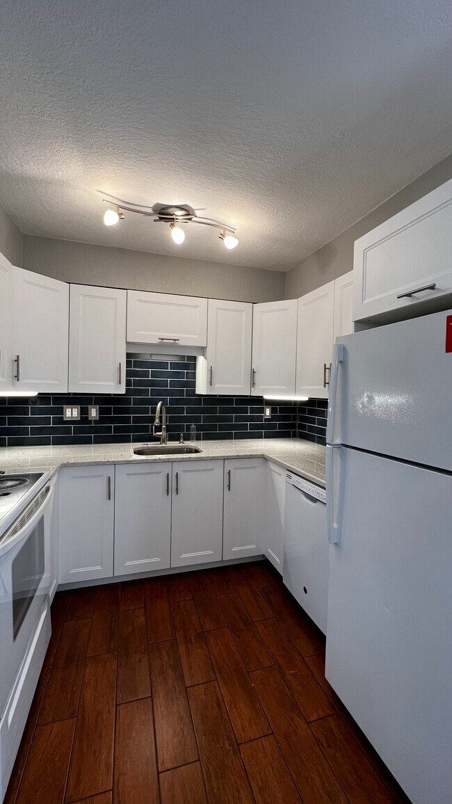 Building Photo - 12057 E Harvard Ave