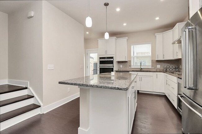 Building Photo - Stunning 3BD/3.5BA End Unit w/ City Views!