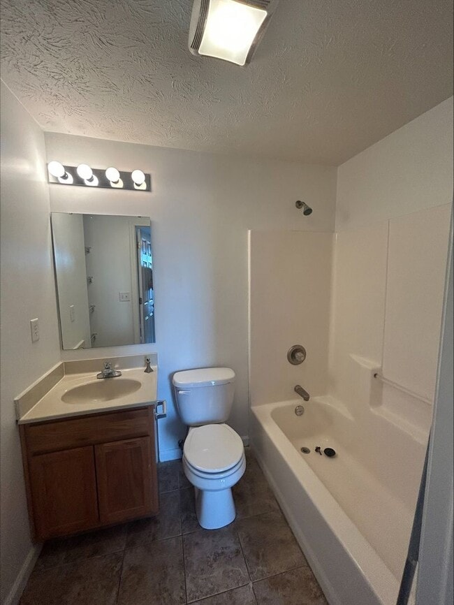 Building Photo - Large 3 Bedroom Townhome Available For Short-Term Lease! Brand New Flooring and Paint!