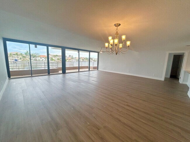 Building Photo - Beautifully Remodeled 2/2 Waterfront Unit ...