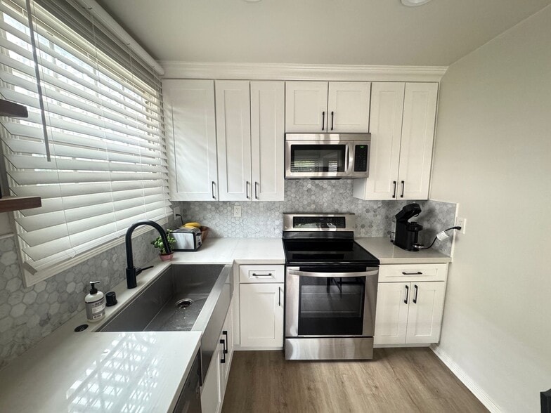 New kitchen cabinets and appliances - 630 E San Antonio Dr