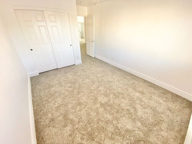 Building Photo - STUNNING 2 STORY HOME IN A GUARD GATED COM...