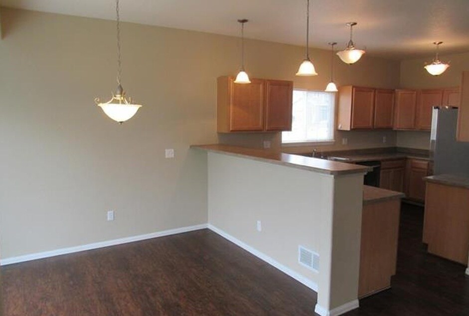 Dining room view into kitchen. - 7334 Pearly Heath Rd