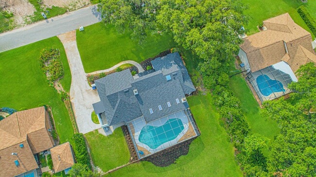Building Photo - Beautifully Updated 3/2 Pool Home with Large Backyard in Lake Ajay (Gated Community)